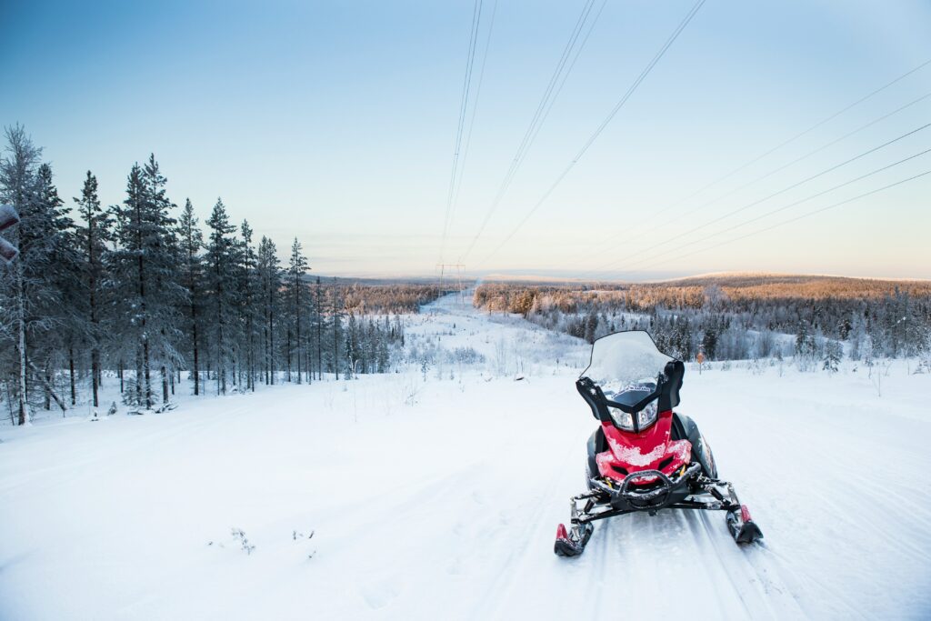 Snowmobiling in rovaniemi, lapland, finland, why visit lapland