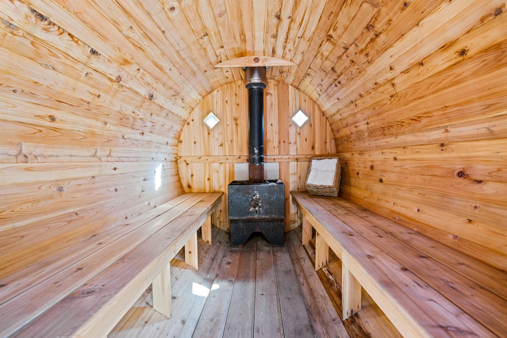 Stove and Benches in Sauna