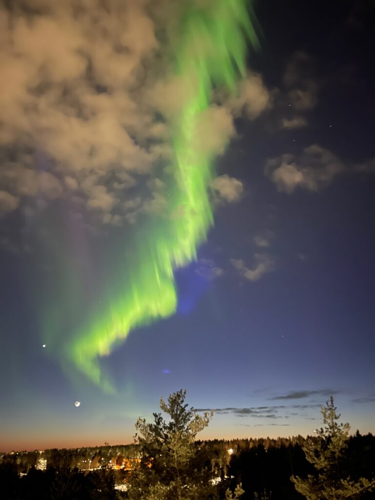 Northern Lights Over Arctic Forests – Aurora Borealis Scenes. lapland travel.