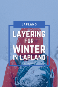 Travelers wearing proper winter layers in Lapland, Finland, including thermal base layers, insulating mid-layers, waterproof jackets, hats, gloves, and snow boots for Arctic conditions.