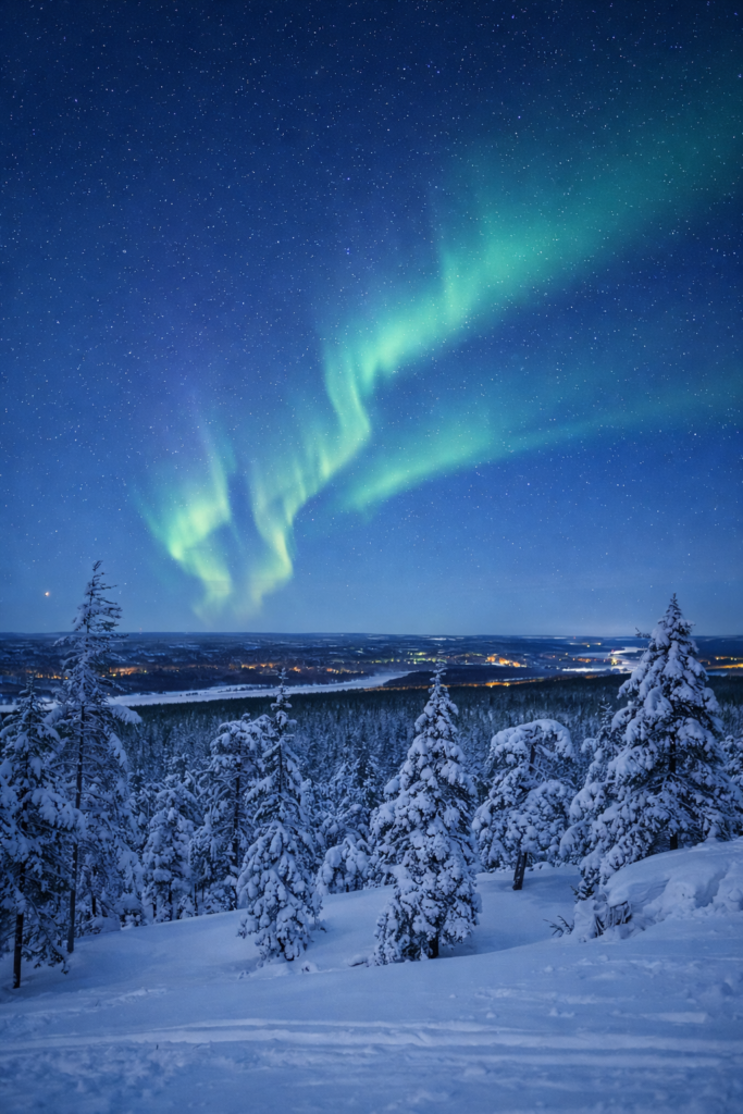 northern lights in rovaniemi lapland. Northern Lights dancing over snowy landscape in Finnish Lapland